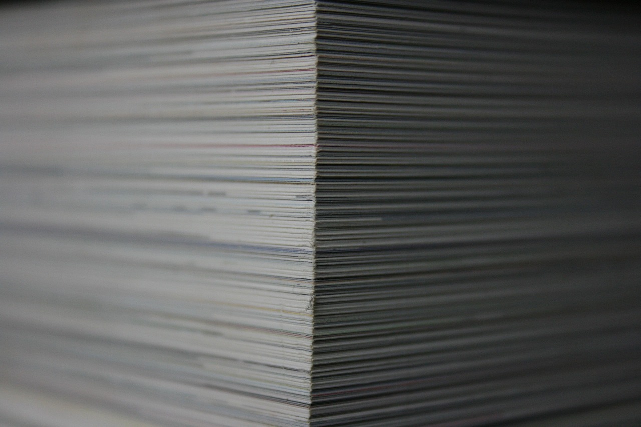 Editorial photo for Can Your Employer Dock Pay for Register Shortages or Equipment Loss?, showing employment records and workplace documents.