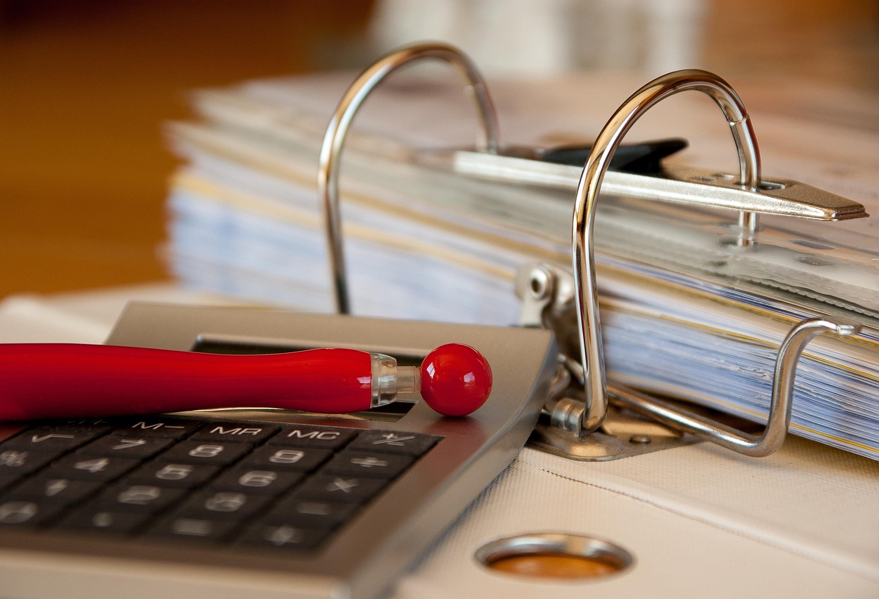 Editorial photo for Breach Of Non-Disparagement In Employment Agreements: Protecting Reputations, showing legal research and consultation documents.