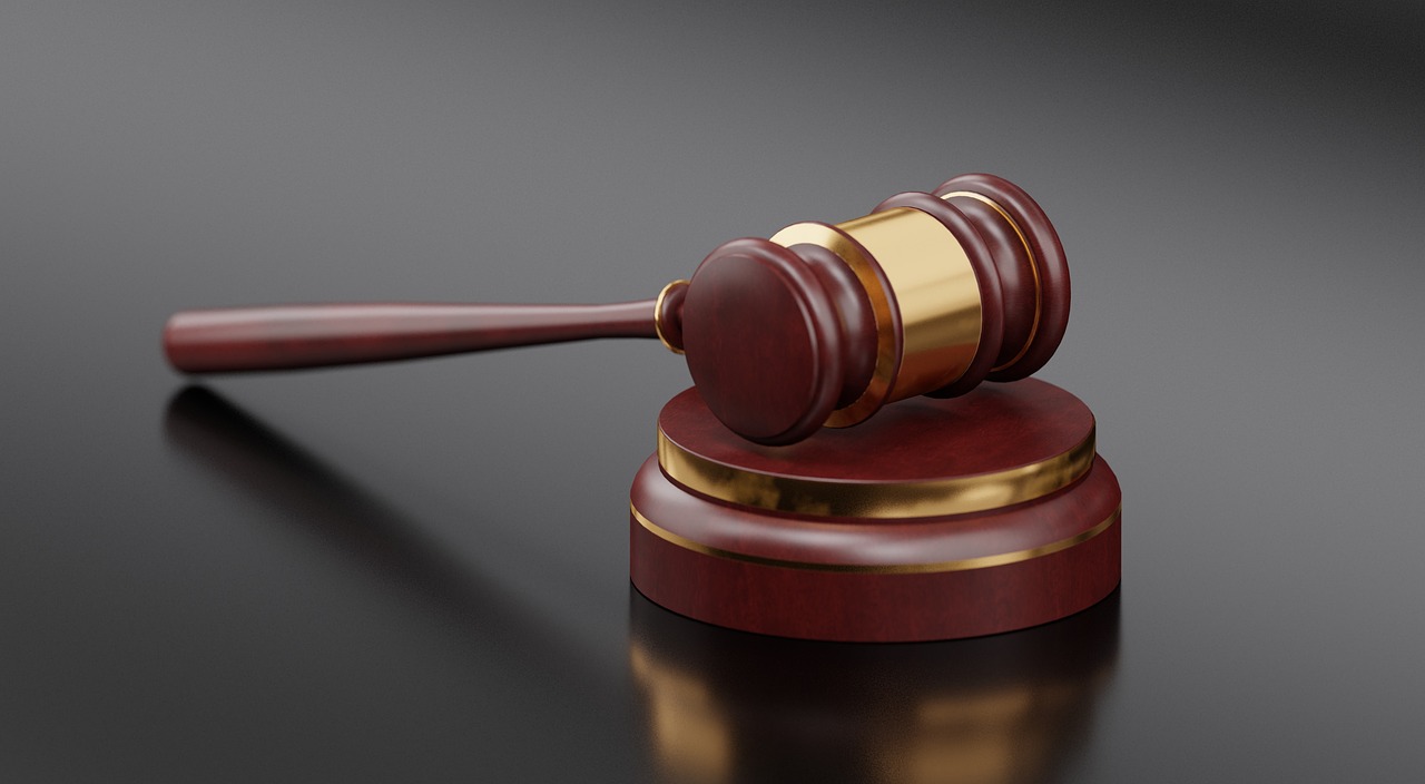 Editorial photo for Discrimination In Freelance Writing Opportunities: Seeking Redress For Biased Treatment And Compensation, showing legal research and consultation documents.