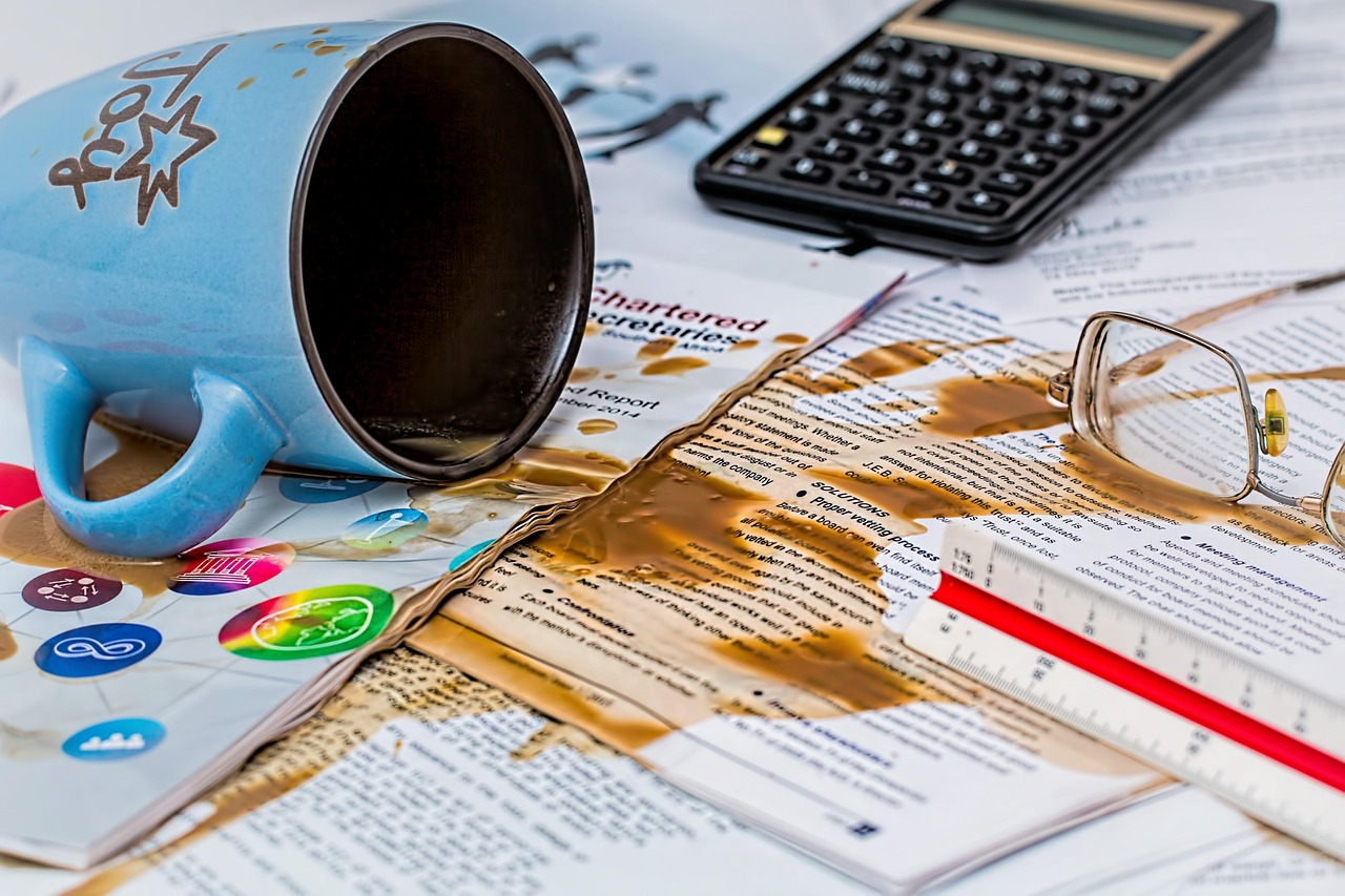 Editorial photo for Can I Sue My Employer for Wrong H1b Advice, showing employment records and workplace documents.
