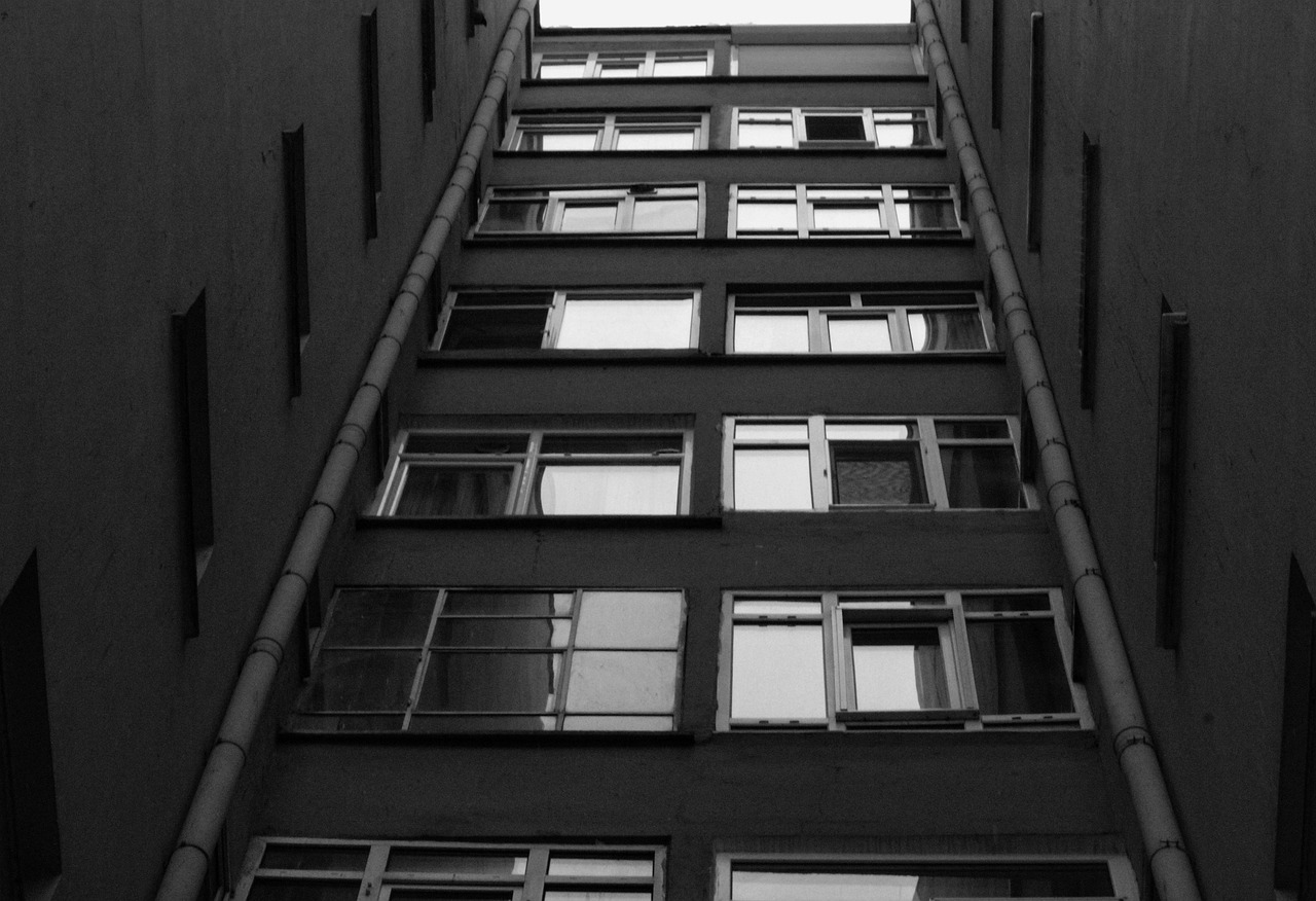 Editorial photo for Can a Property Manager Charge Application Fees for a Unit Already Taken?, showing rental housing, leases, and property notices.