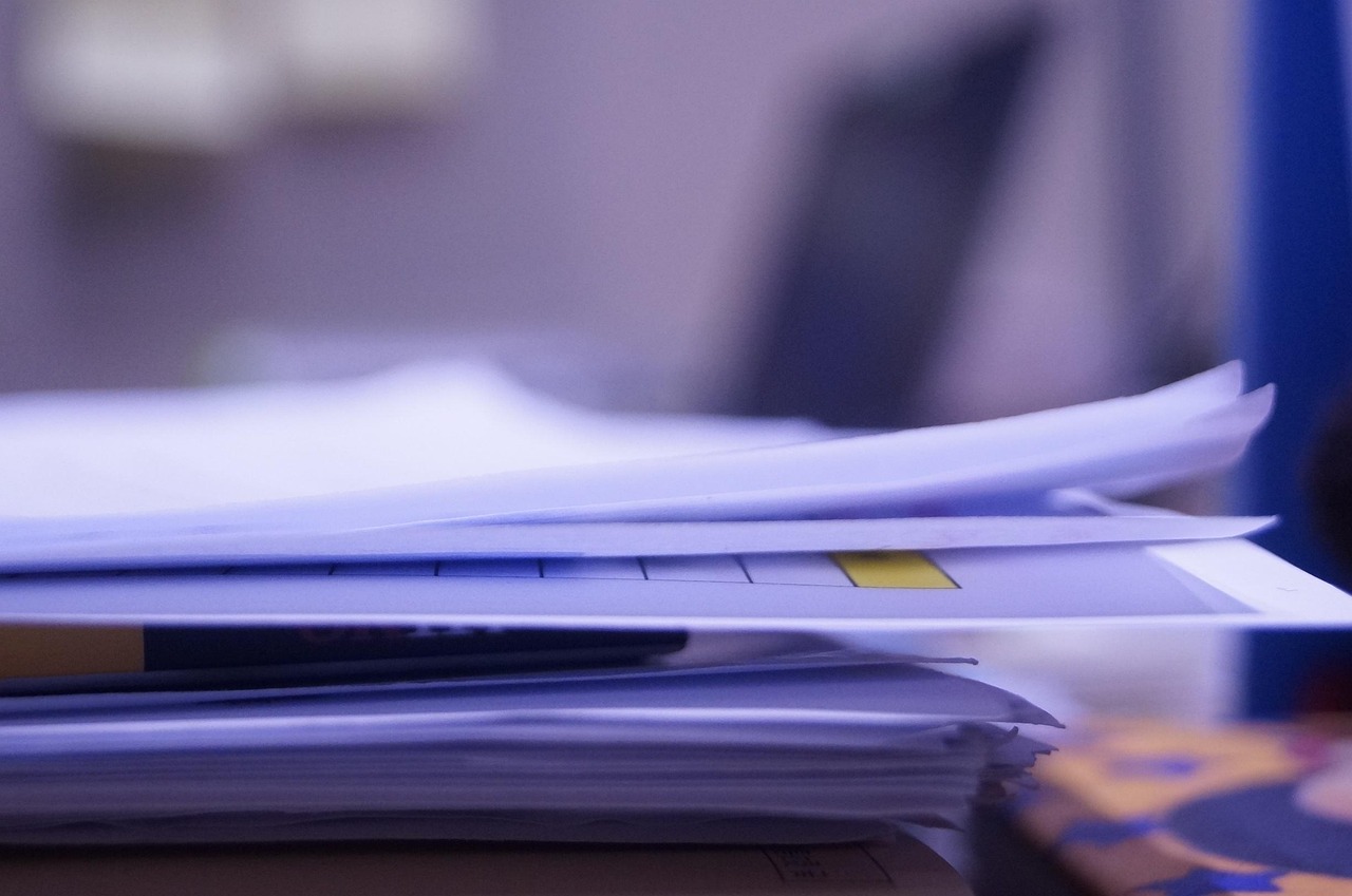 Editorial photo for Emotional Distress In Online Gaming Communities: Legal Options For Harassment And Toxicity, showing employment records and workplace documents.