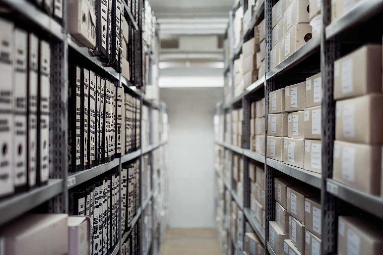 Editorial photo for Can I Sue My Previous Employer for Emotional Distress and Overloading Work, showing employment records and workplace documents.